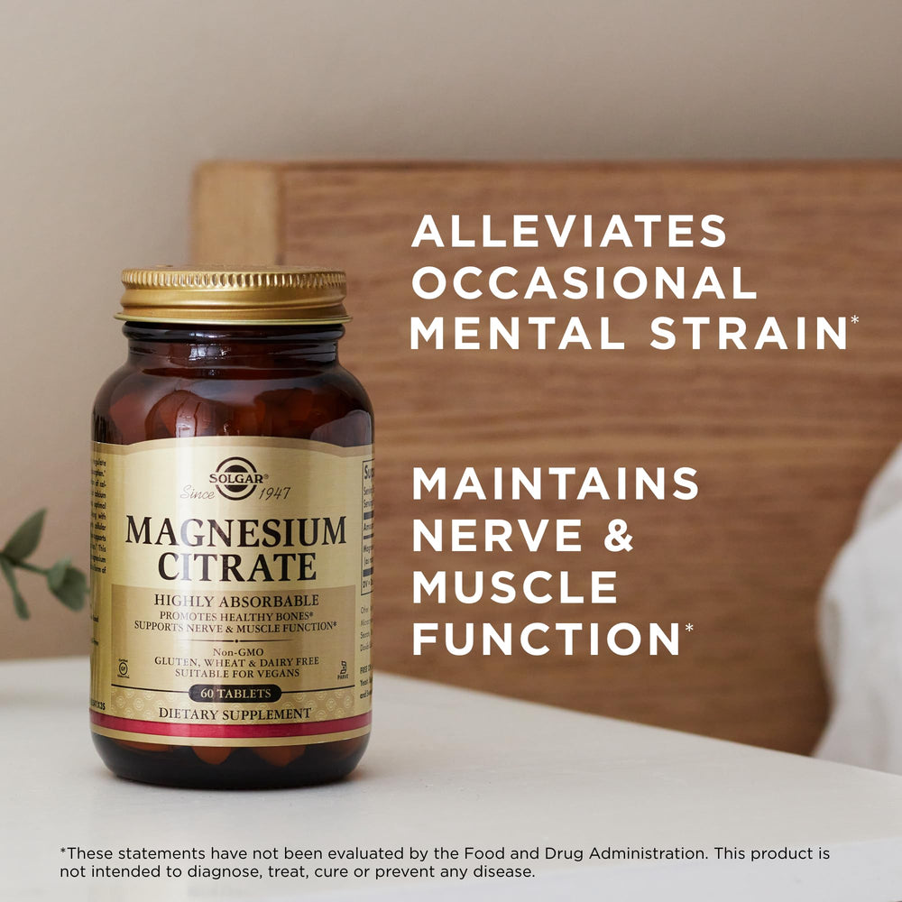 Solgar Magnesium Citrate bottle on desk illustrating simple daily routine.
