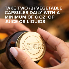 Solgar Psyllium Husks Fiber poured into glass for digestion