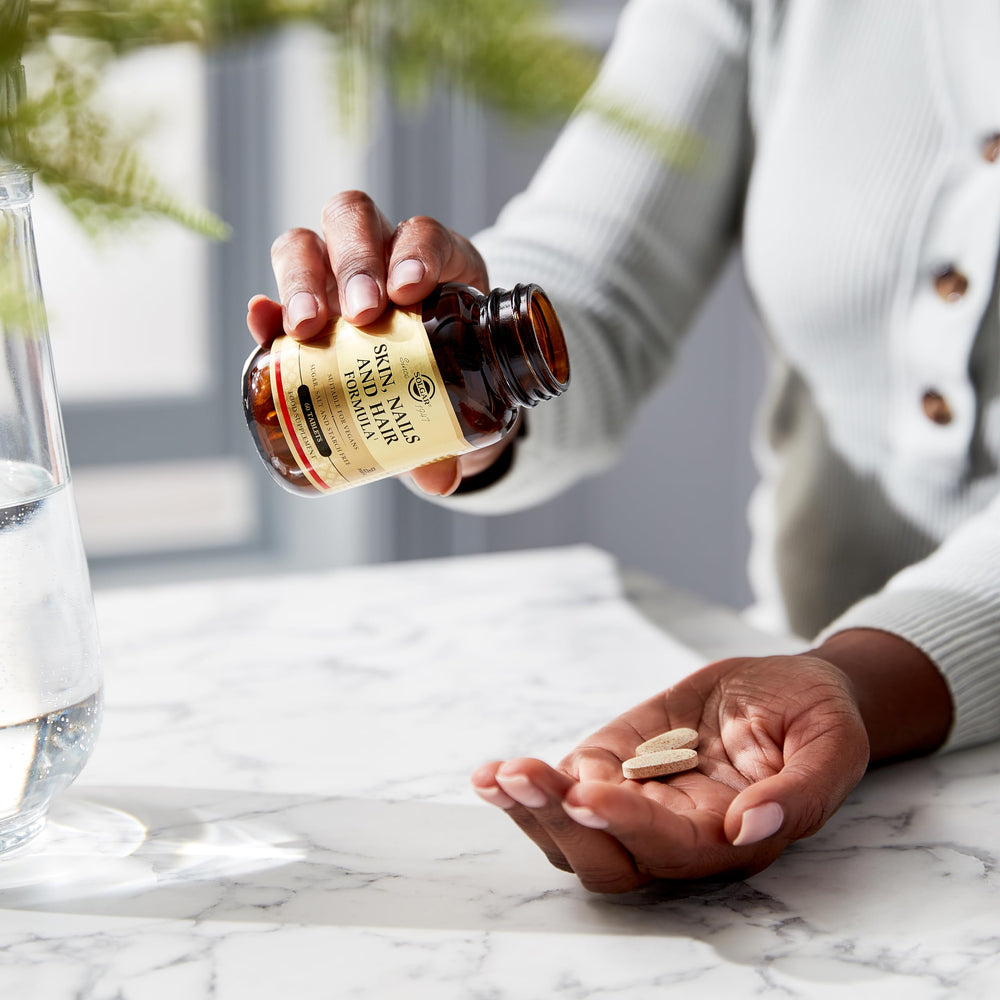 Solgar vegan formula indicating non-GMO and dairy-free