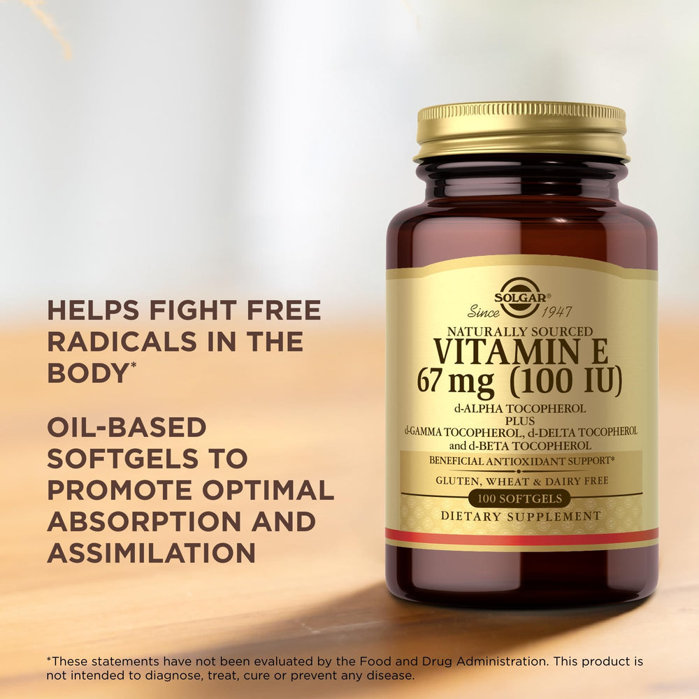Close-up of Solgar Vitamin E softgels illustrating oil-based capsules for absorption.