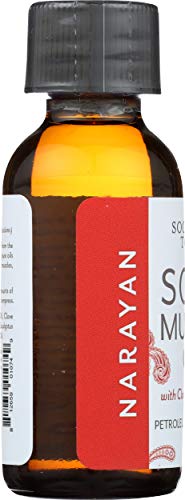 Soothing Touch Narayan Oil texture spreading smoothly over skin for deep absorption.