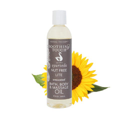 Soothing Touch Nut Free Lite Massage Oil bottle pour for relaxing, nut-free massages.