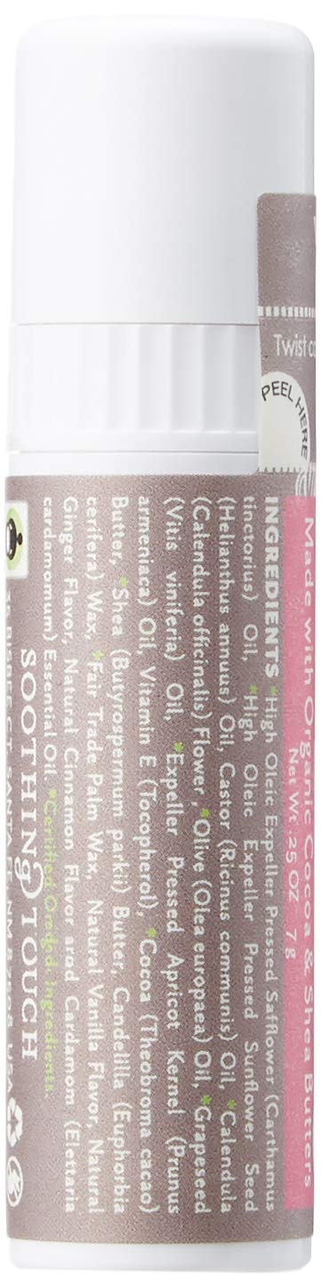 Soothing Touch Vanilla Chai lip balm application on lips provides vegan nourishment and flavor.