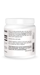 Source Naturals Glycine powder being stirred into water for convenient hydration.