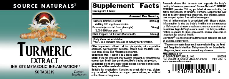 Pouring Source Naturals Turmeric Extract capsules from the bottle