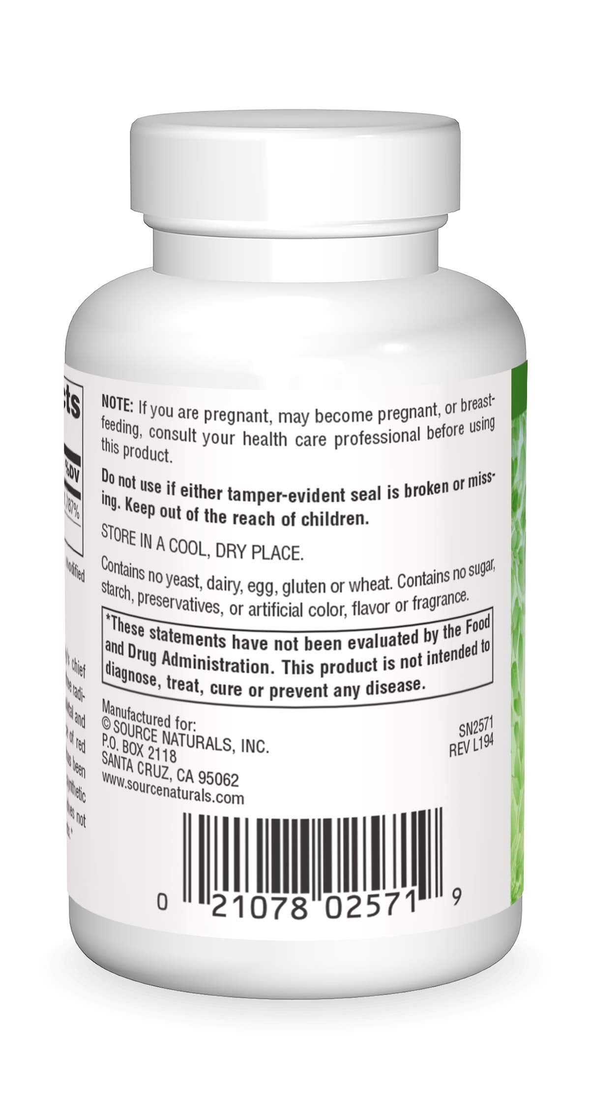 Close-up of Source Naturals Vitamin E tablets highlighting the vegan formula