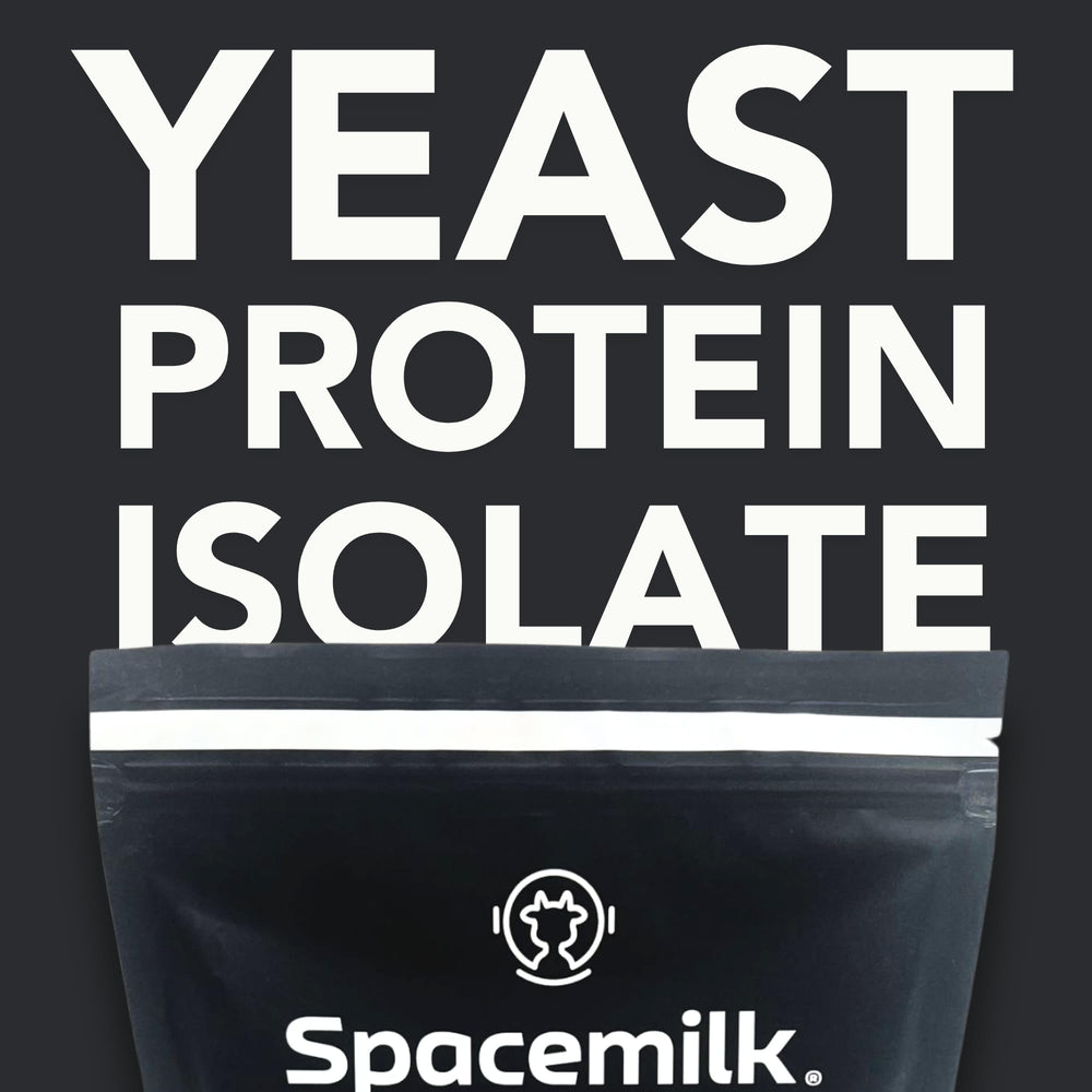 Spacemilk unflavored protein powder stirred into a shake glass for seamless blends.