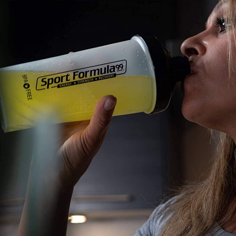 Sport Formula 99 powder in glass with vibrant fruit punch flavor