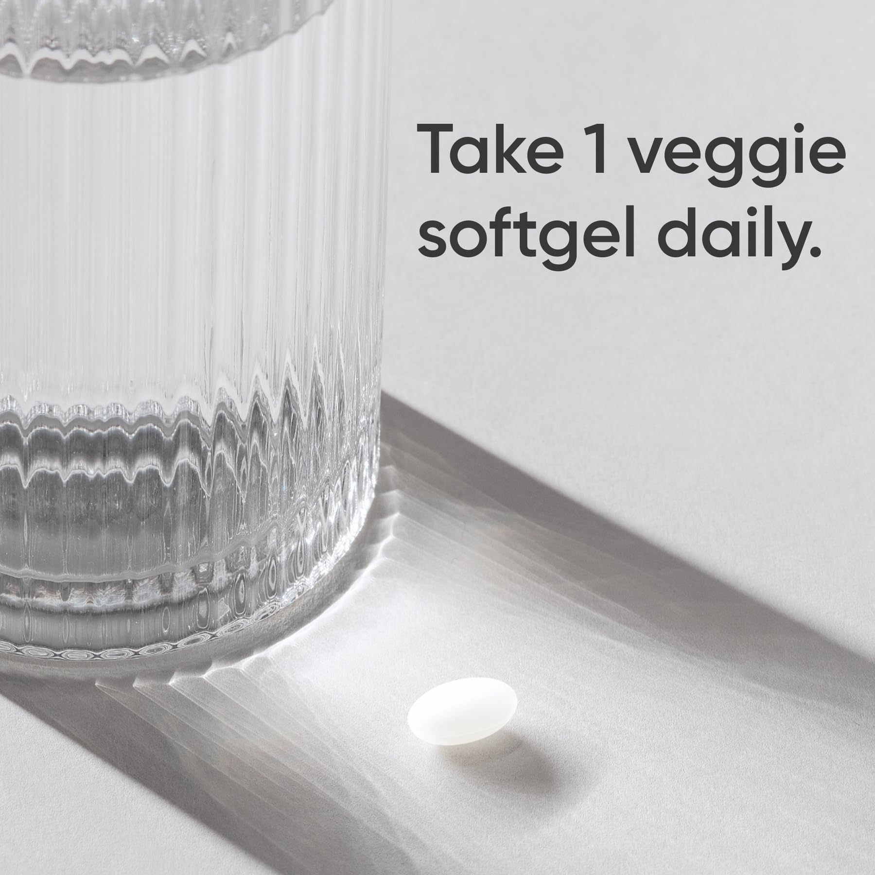 Sports Research Biotin 10,000 mcg, botella reversa, etiqueta legible.