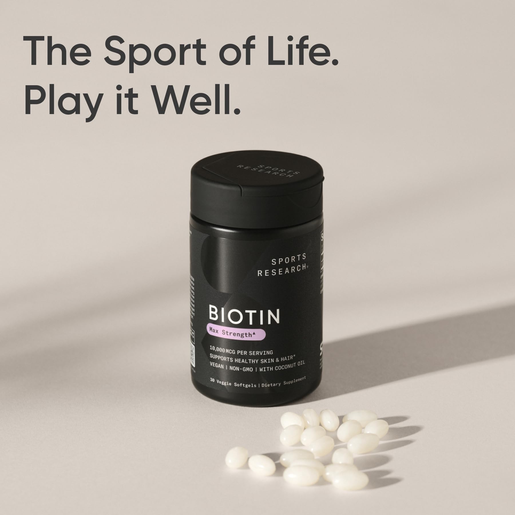 Sports Research Biotina 10,000 mcg envase con cápsulas veggie sellado.