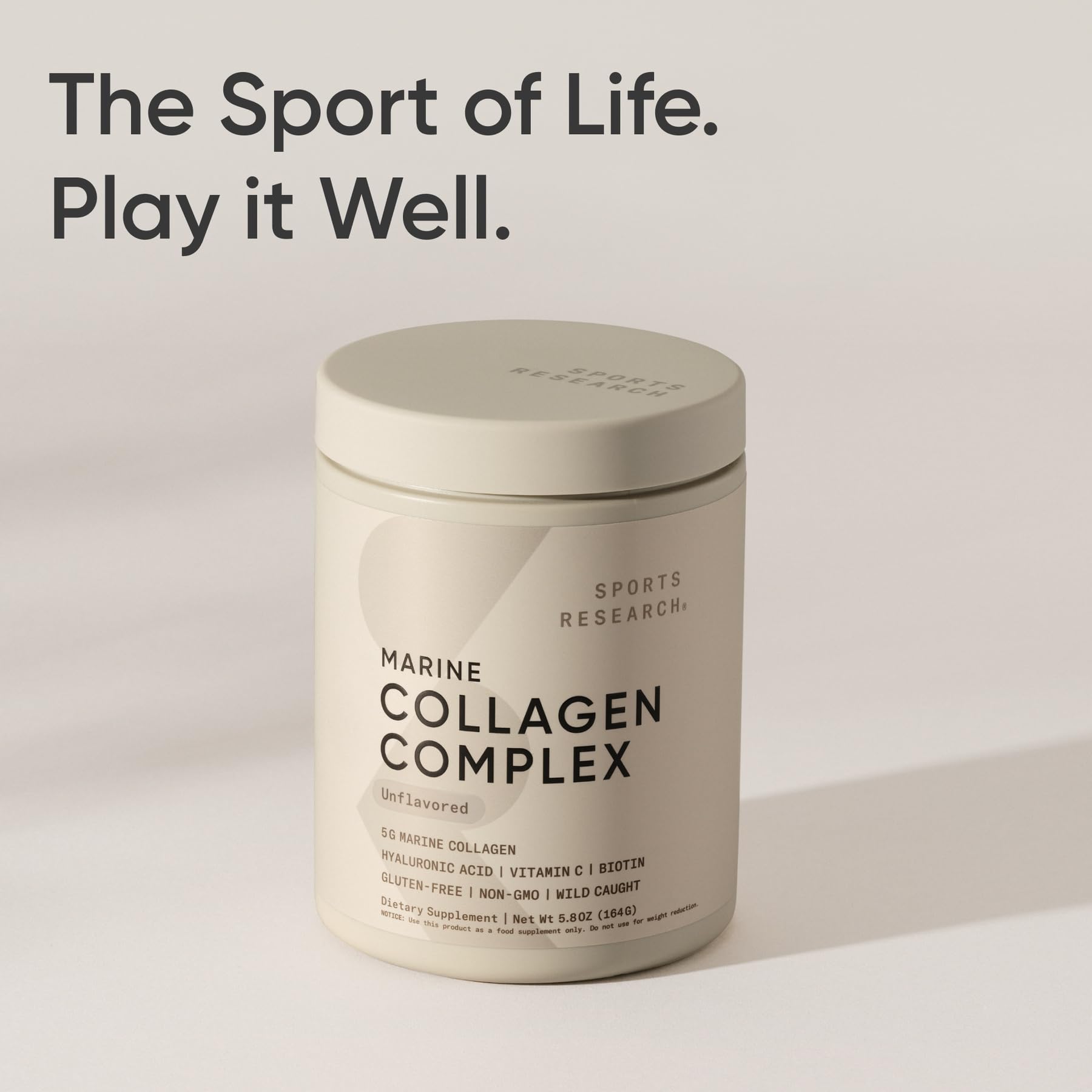 Powder in glass demonstrating neutral blend of Sports Research Collagen Beauty Complex
