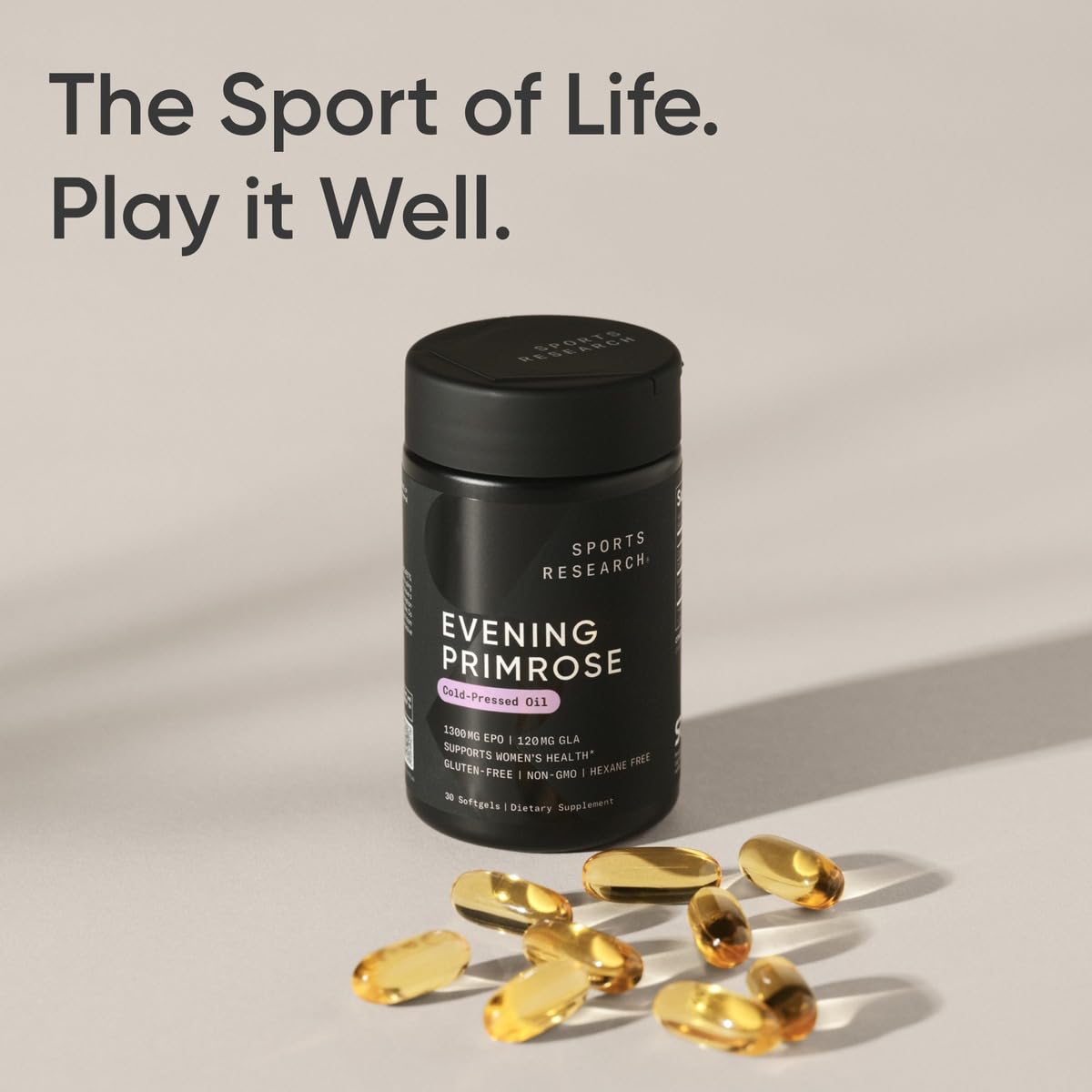 Sports Research Evening Primrose capsules arranged with a glass of water