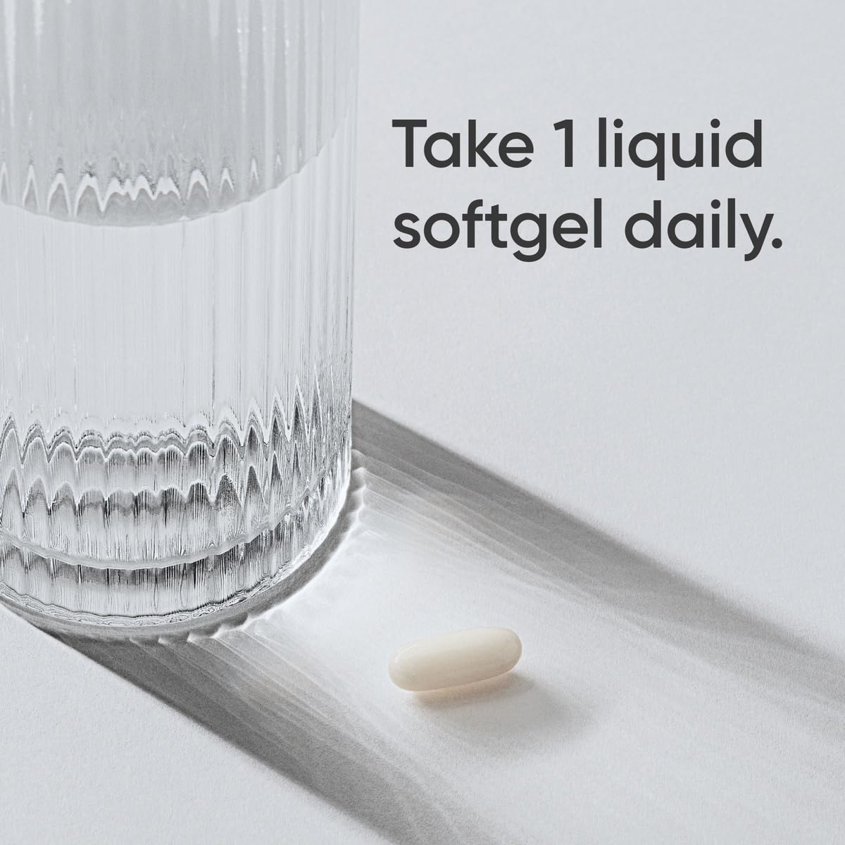 Sports Research L-Theanine capsules close-up promoting calm focus without jitter.