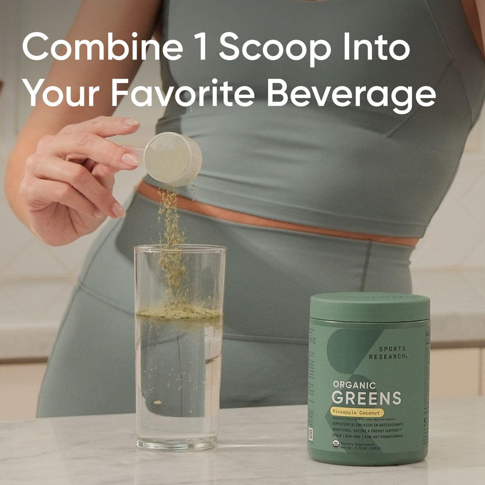 Sports Research Organic Pineapple Coconut Greens poured into glass for a tropical boost