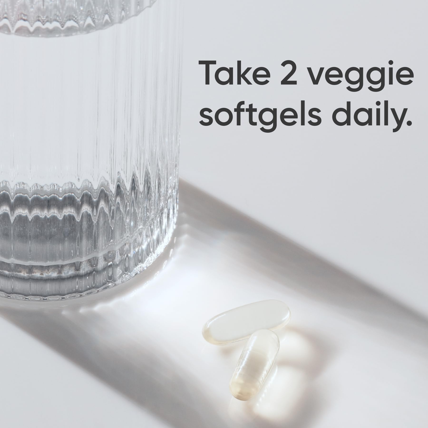 Sports Research vegan omega-3 D3 bottle label emphasizes algae oil source.