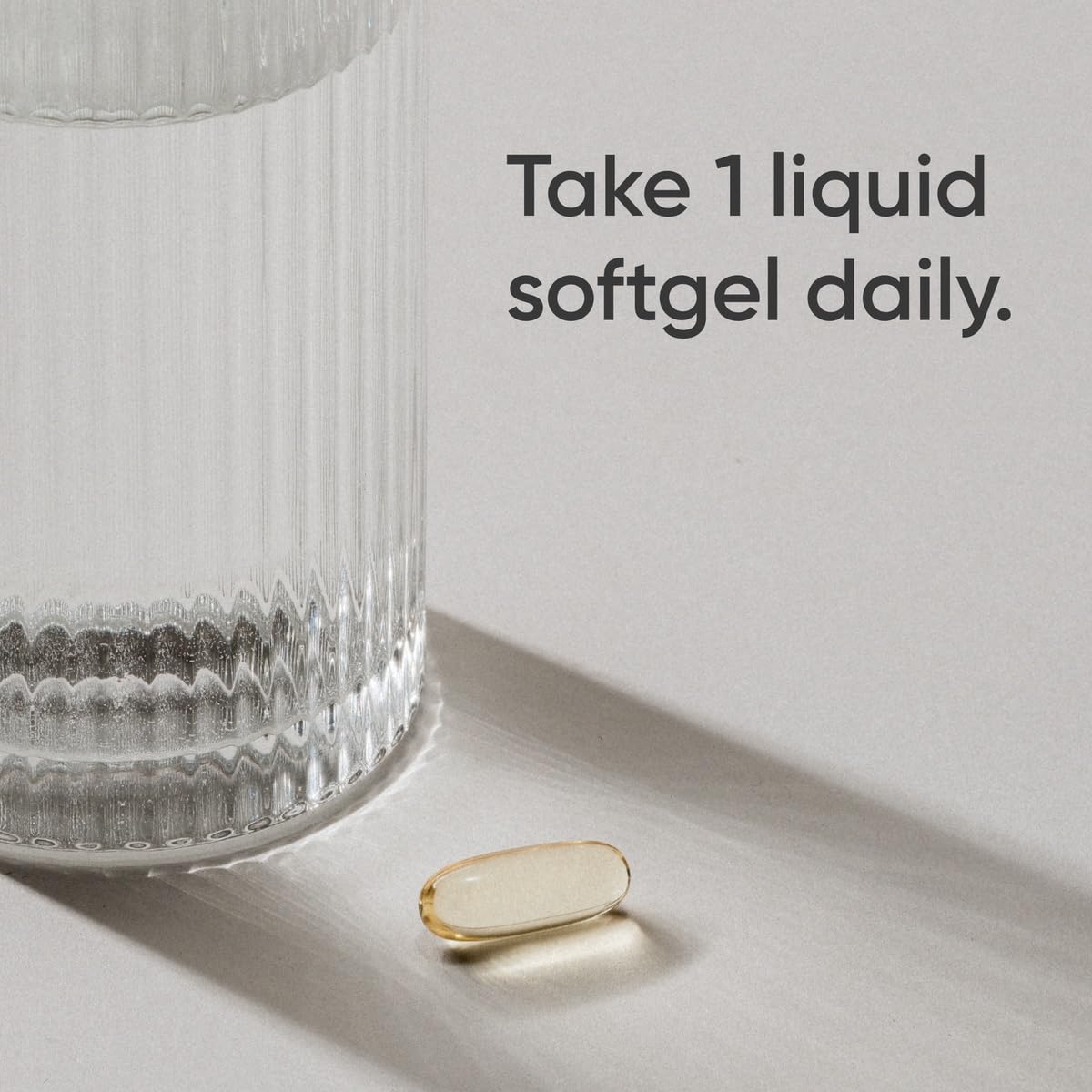 Sports Research bottle being poured, suggesting convenient daily use.