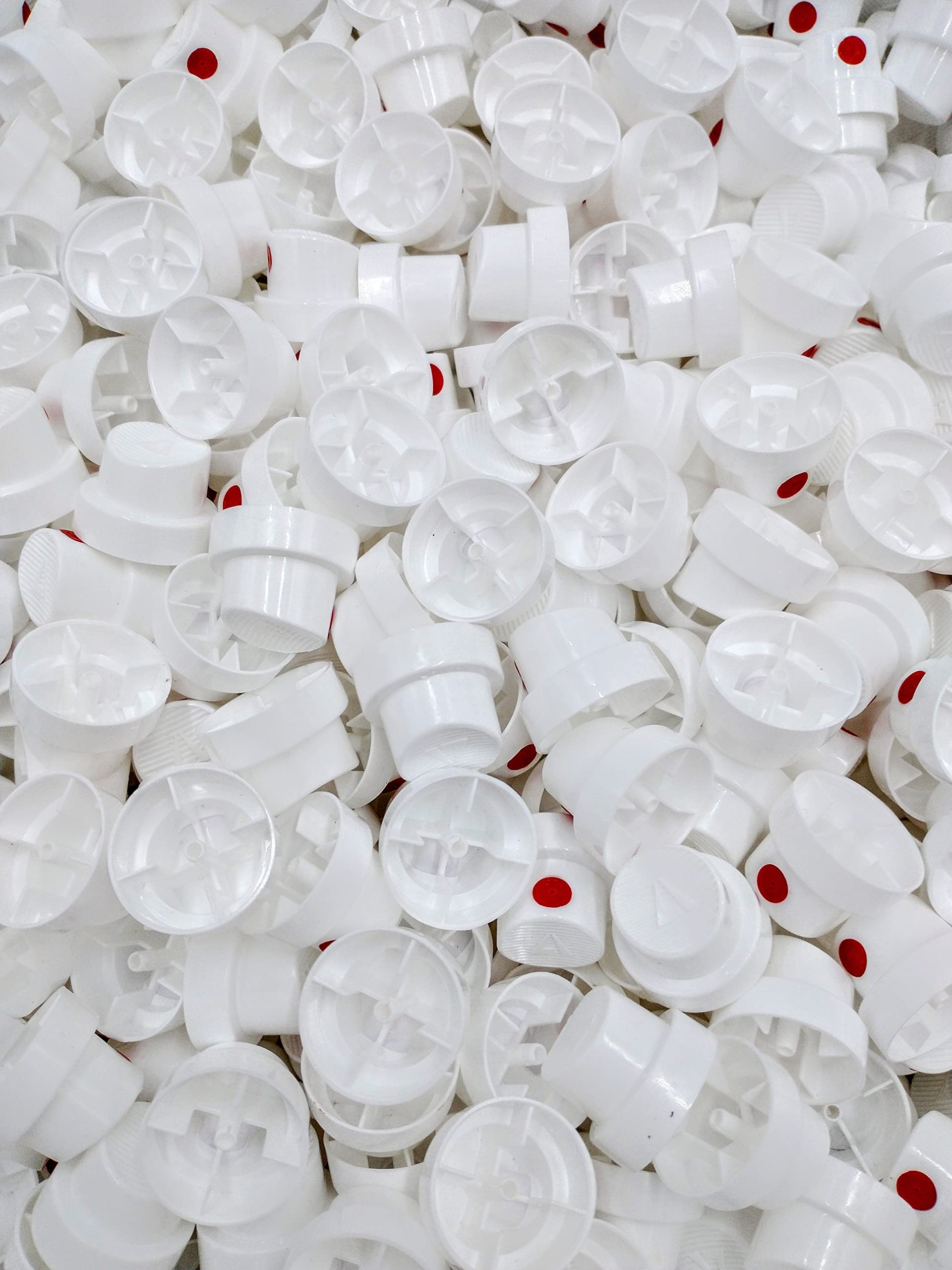 Spray Paint Caps Pink Dot Cap Wide on a European valved can for broad coverage.