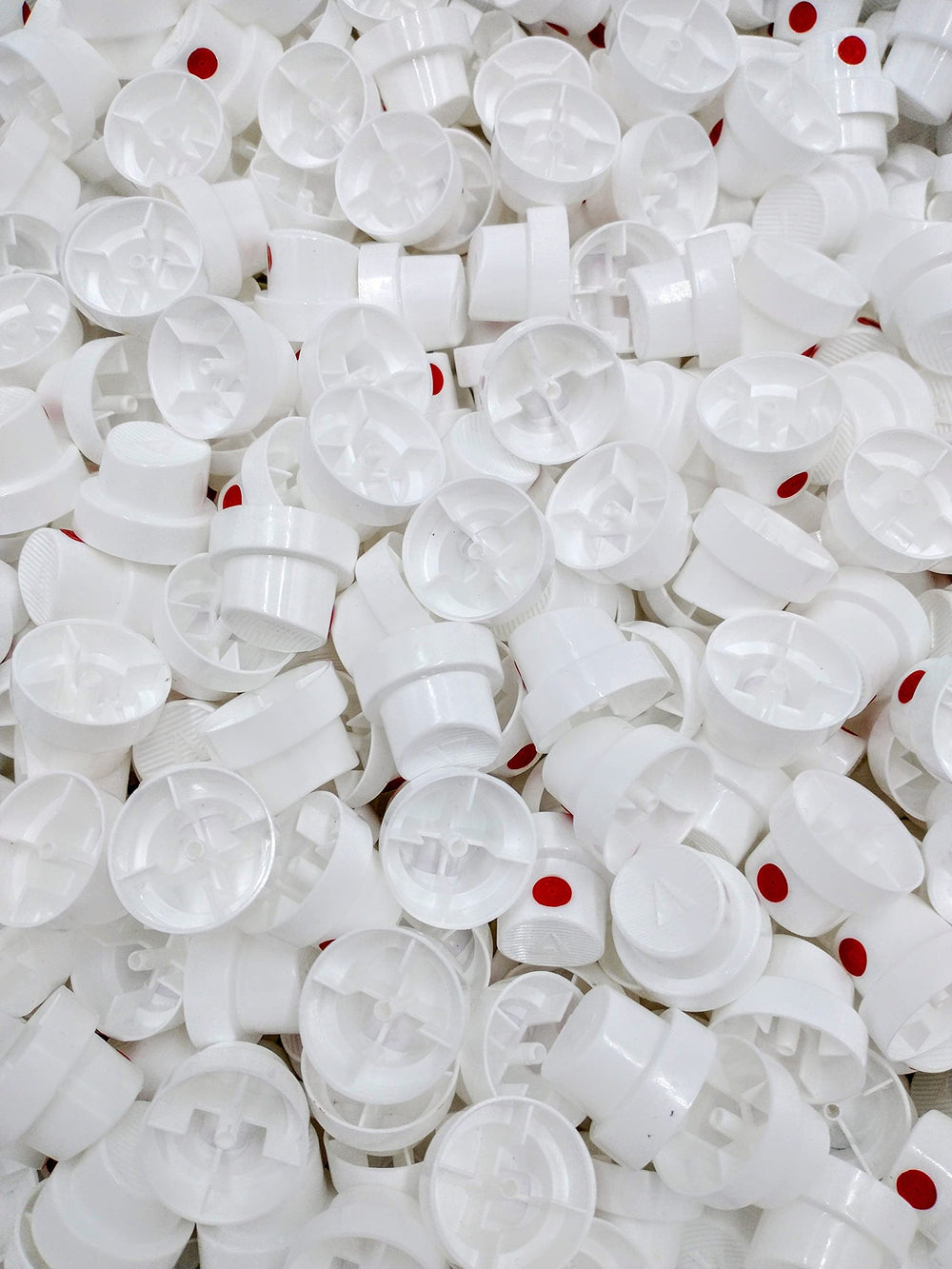 Spray Paint Caps Pink Dot Cap Wide on a European valved can for broad coverage.