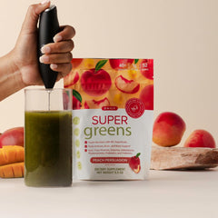 SPRIGS daily energy-support bottle beside a shaker for on-the-go mix