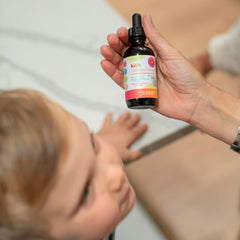 SPRIGS Kids Cal-Combo tincture closeup highlighting a sweet-taste formula