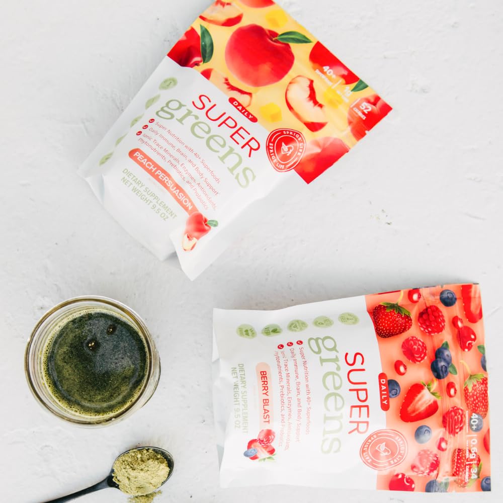 SPRIGS peach-flavored greens powder in a glass for daily nutrition