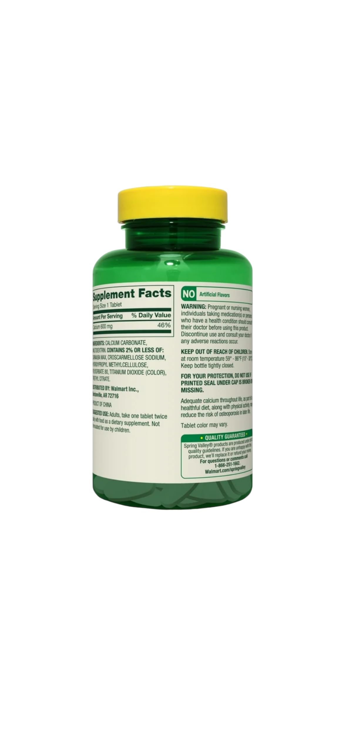 Spring Valley calcium bottle beside a glass of water for easy daily intake
