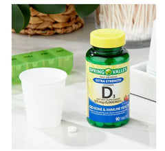 Spring Valley Vitamin D3 fast dissolve strawberry flavor bottle on kitchen counter.