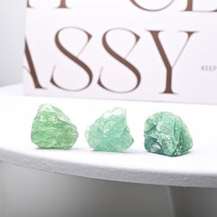 SSAKUGGI Green Fluorite rough stones closeup showing natural color variation