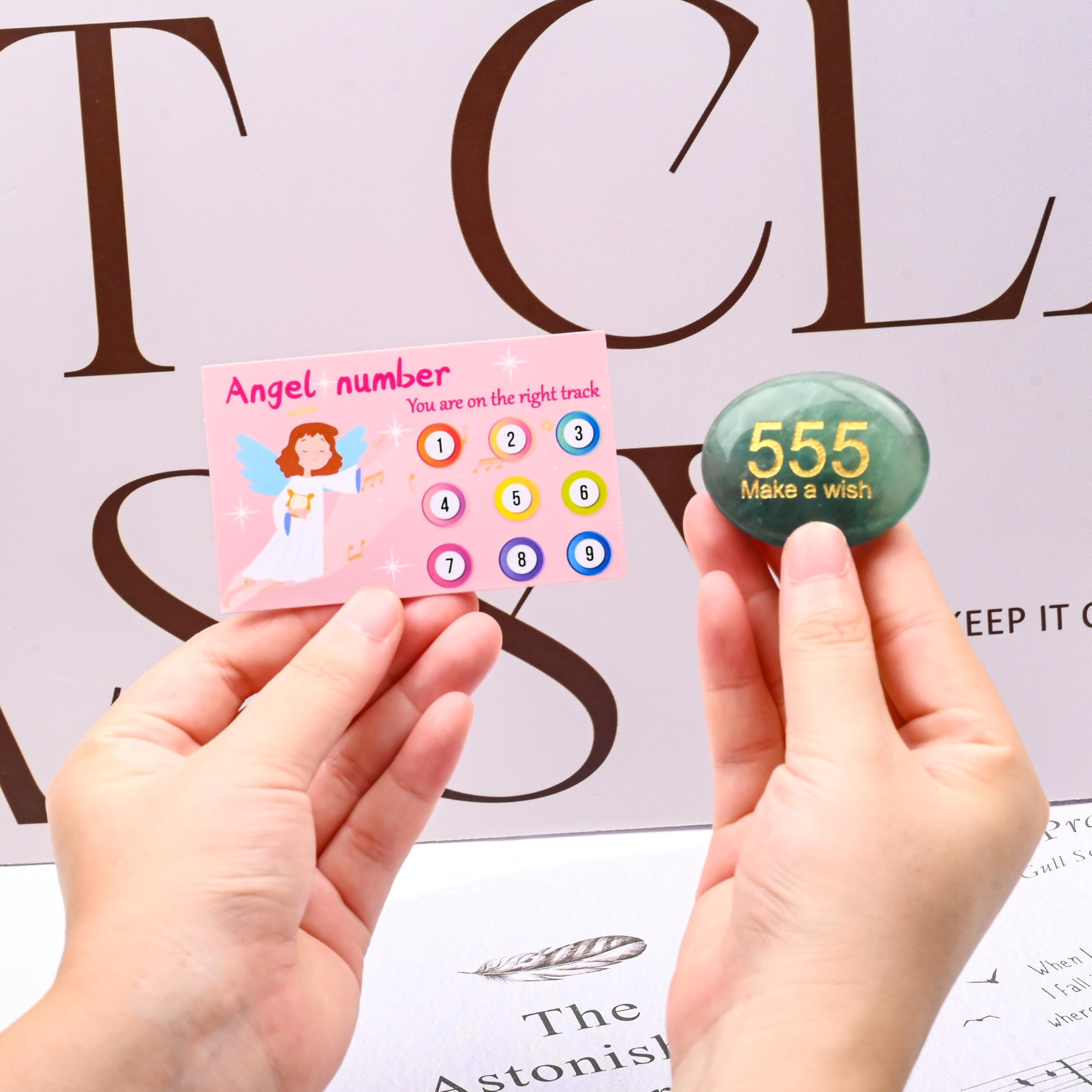 Hand carved SSAKUGGI crystal featuring angel numbers 555 for lucky energy