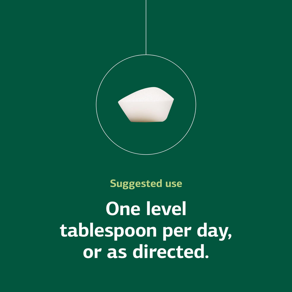 Standard Process Calcium Lactate Powder with glass and spoon for everyday preparation.