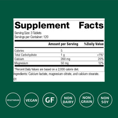 Standard Process Calcium Lactate tablet closeup highlighting compact vegan formula.