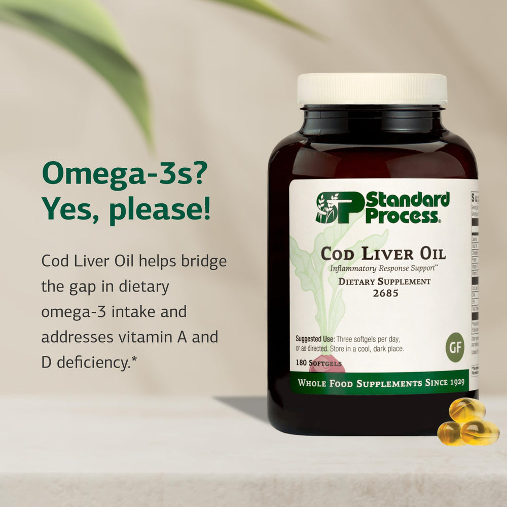 Standard Process Cod Liver Oil softgel close-up highlighting omega-3 content.
