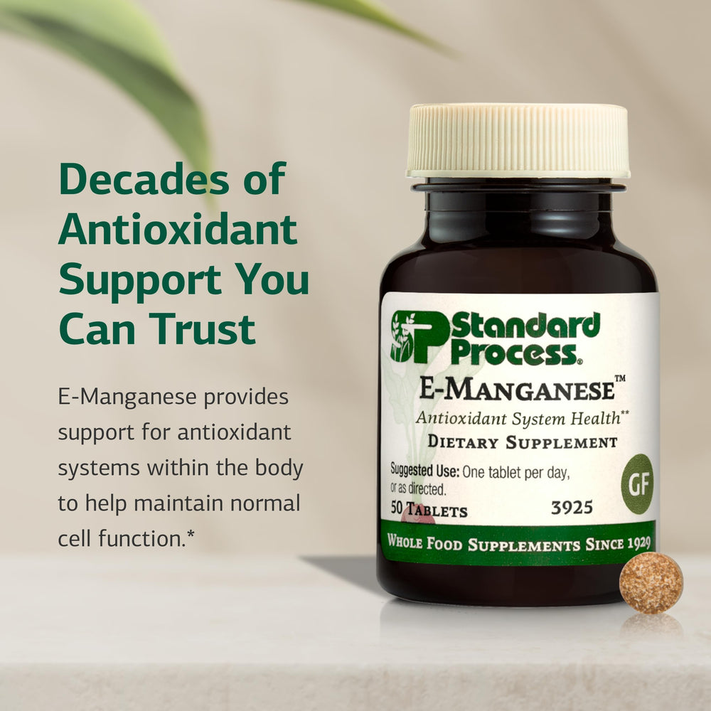 Standard Process E-Manganese bottle pour showing easy daily intake.