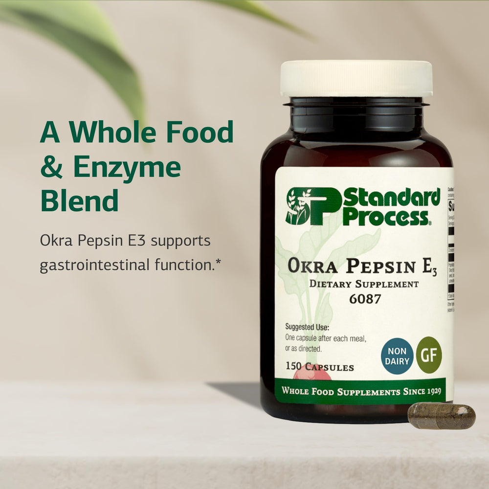 Okra Pepsin E3 capsules close-up, showcasing convenient daily use as a digestive aid.