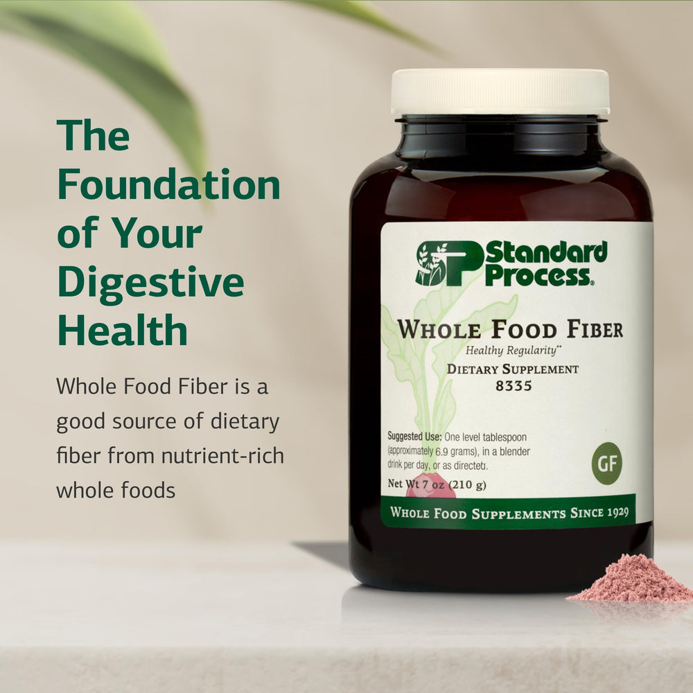Standard Process Whole Food Fiber powder dissolving easily in water.