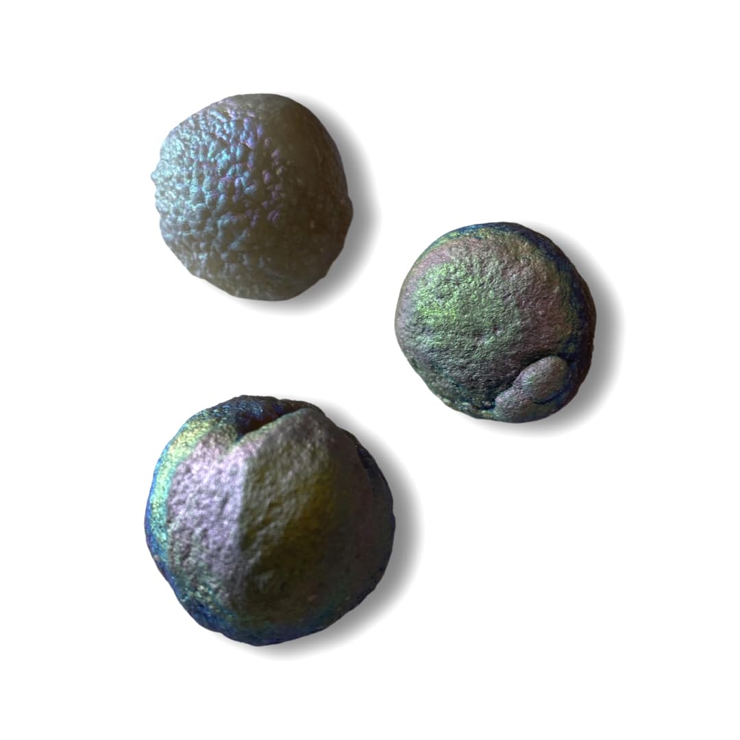 Starborn Rainbow Chalcedony Unicorn Poop under light reveals butterfly-wing iridescence