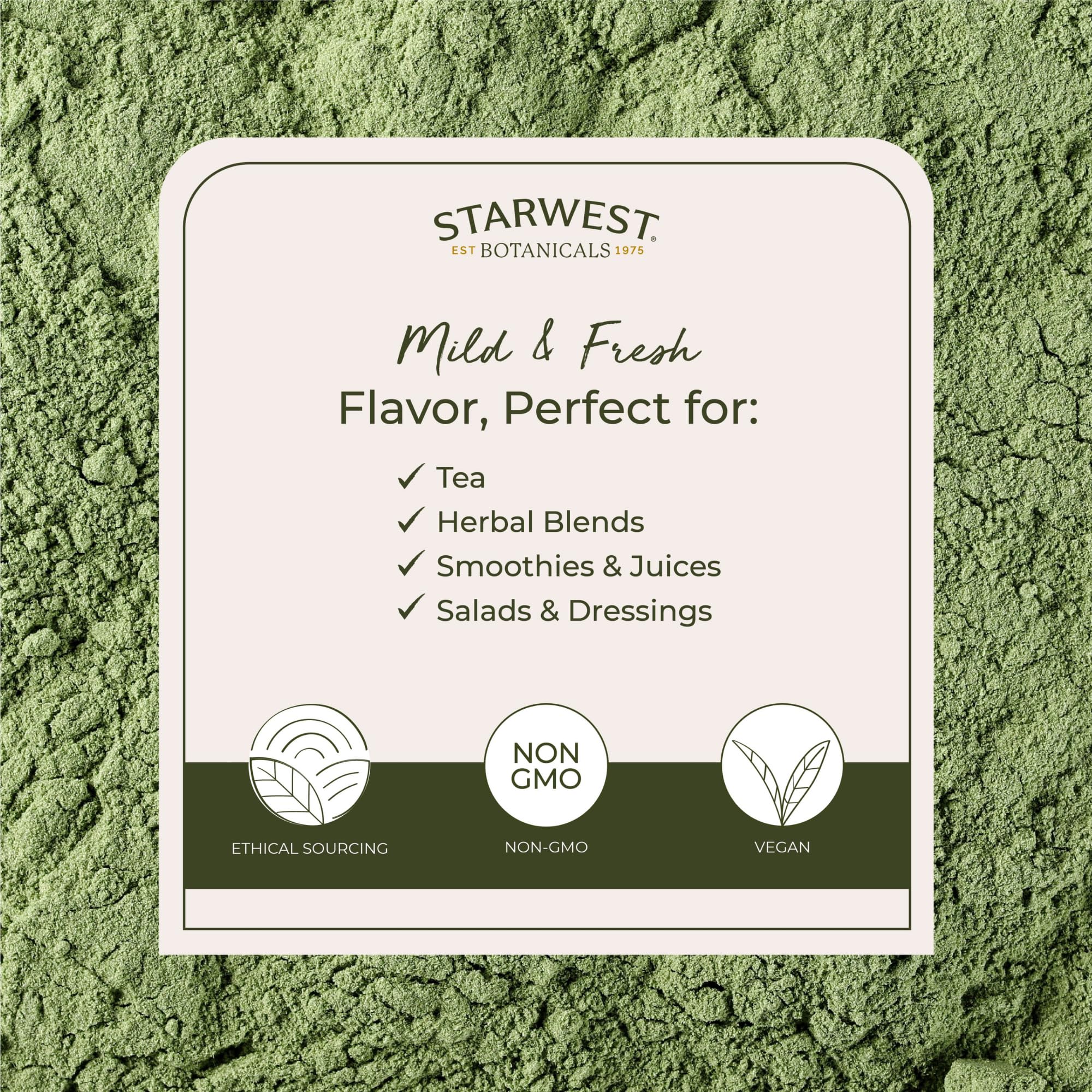 Wheatgrass powder poured into juice for a nutrient-rich drink