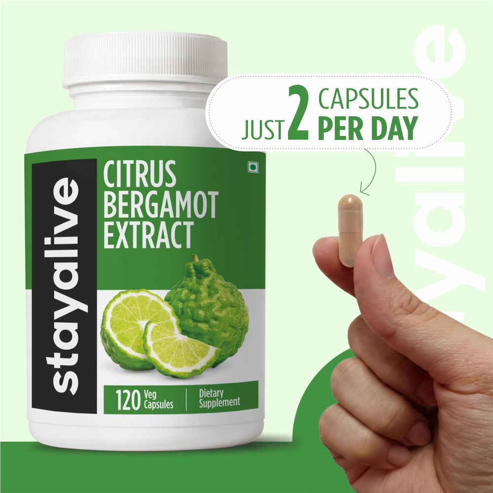 Stay Alive Citrus Bergamot capsules with glass of water—simple daily wellness ritual.