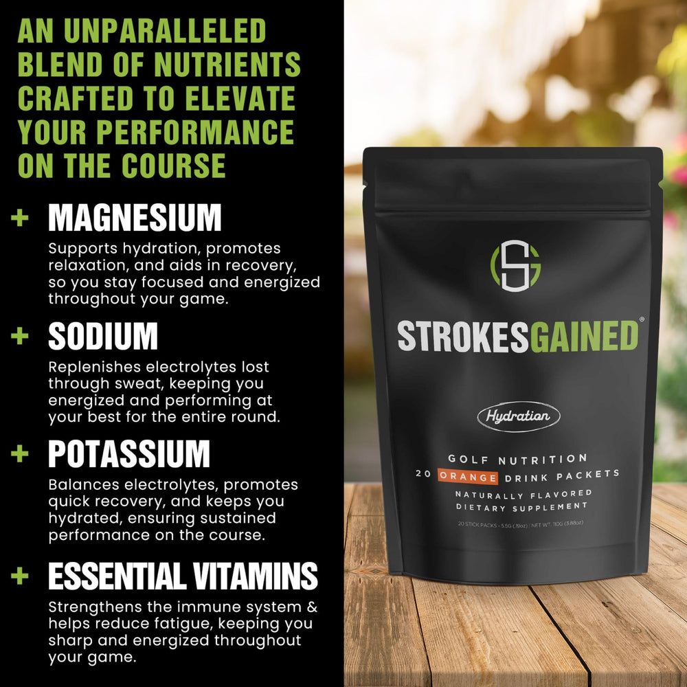 Strokes Gained Hydration orange stick pack on course ideal for steady hydration mid-round.