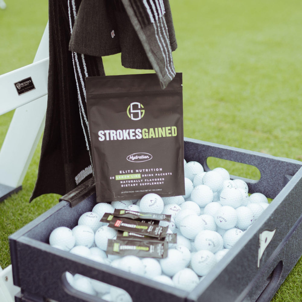 Strokes Gained Hydration orange stick pack recovery support after rounds.