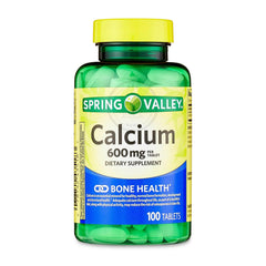 Close-up of 600 mg calcium tablets highlighting strength for bones.