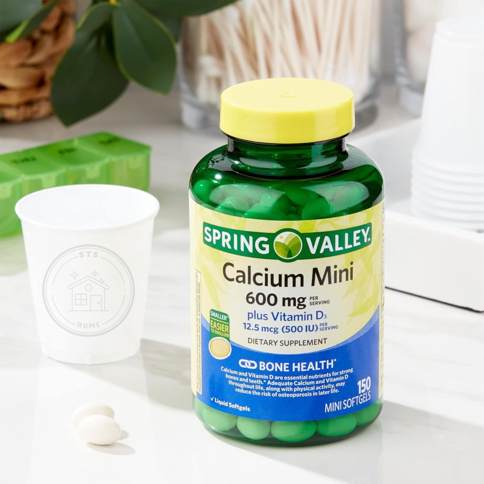 Bottle on a kitchen counter suggests portable bone health support.