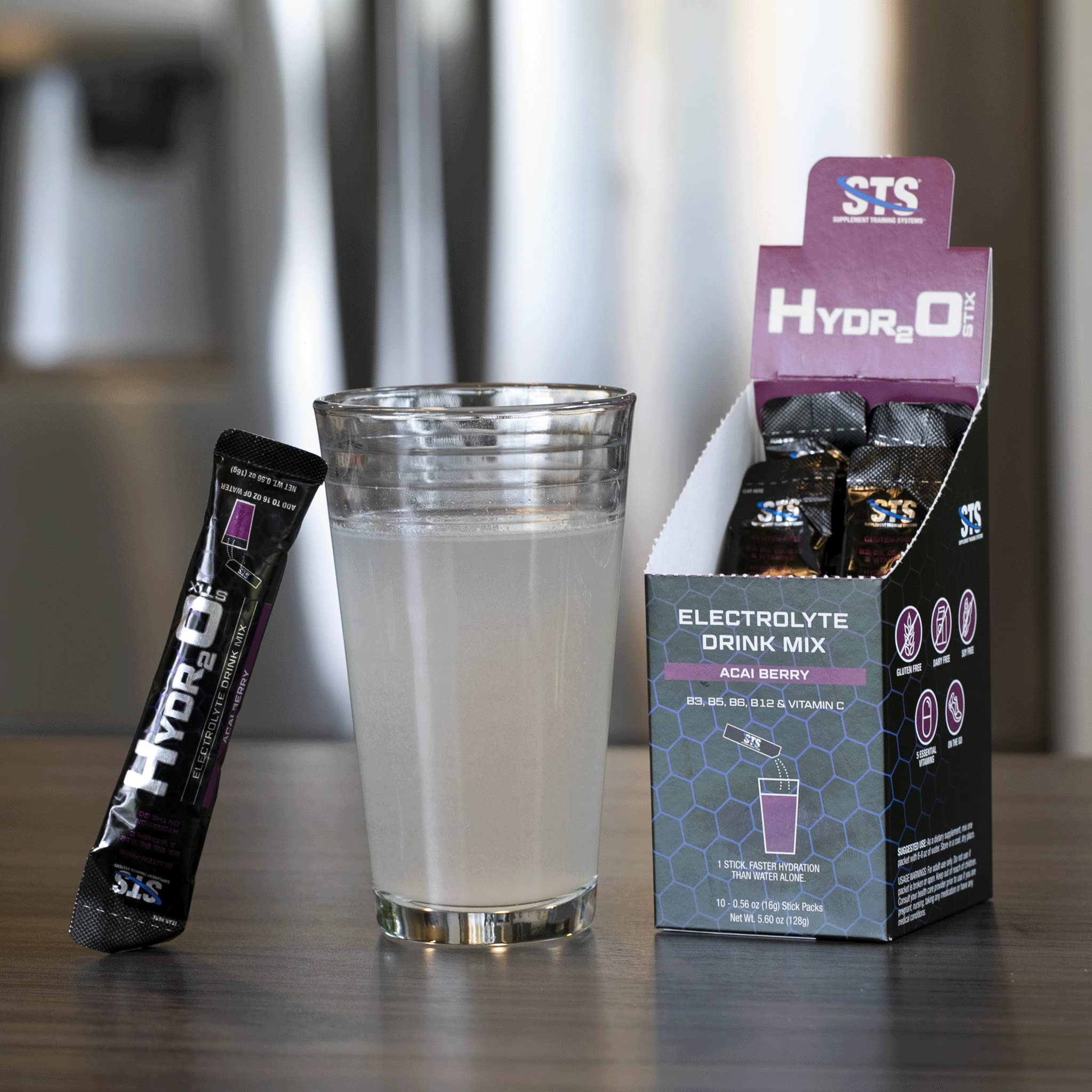 Athlete using STS Hydro Stix during training for hydration.