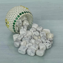 SUBSH Howlite meditation stones in hand support calm focus.