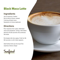 Sunfood Superfoods Black Maca powder being poured into a glass for a smoothie.