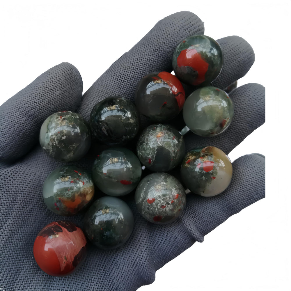 Sunshcat African Bloodstone balls used in decorative grids for calm ambience.