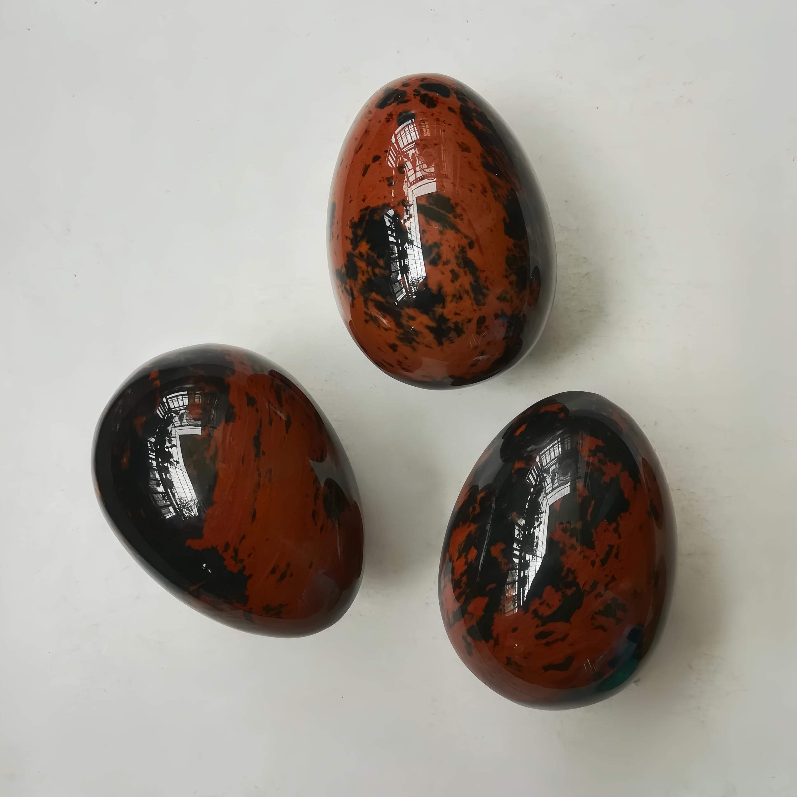 Sunshcat crystal egg sculpture in meditation setup supports focus and reflection.