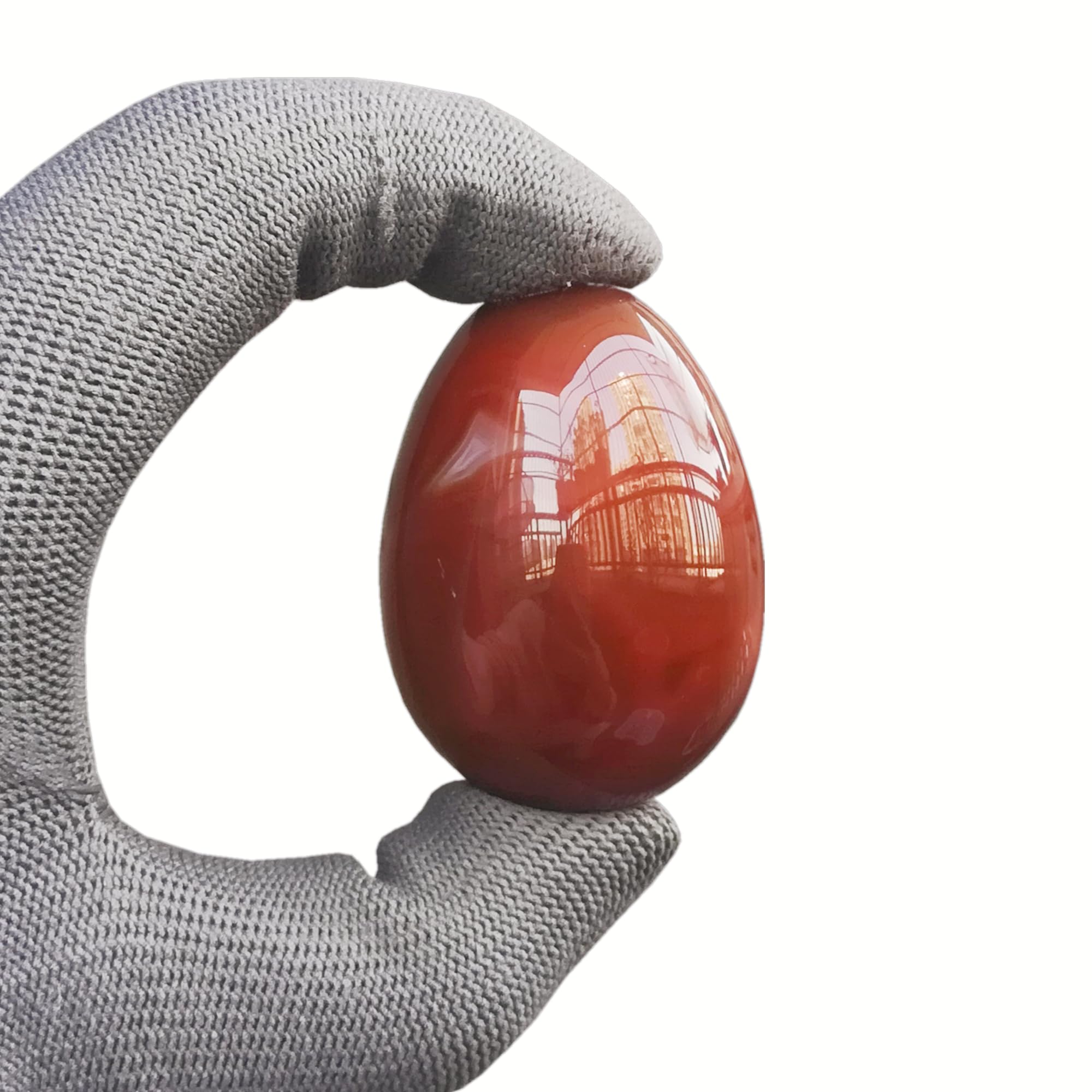 Sunshcat Carnelian Egg on desk for feng shui harmony.