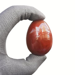 Sunshcat Carnelian Egg on desk for feng shui harmony.