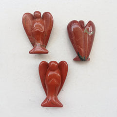 Sunshcat hand-carved jasper angel figure adds natural charm to gift-giving.